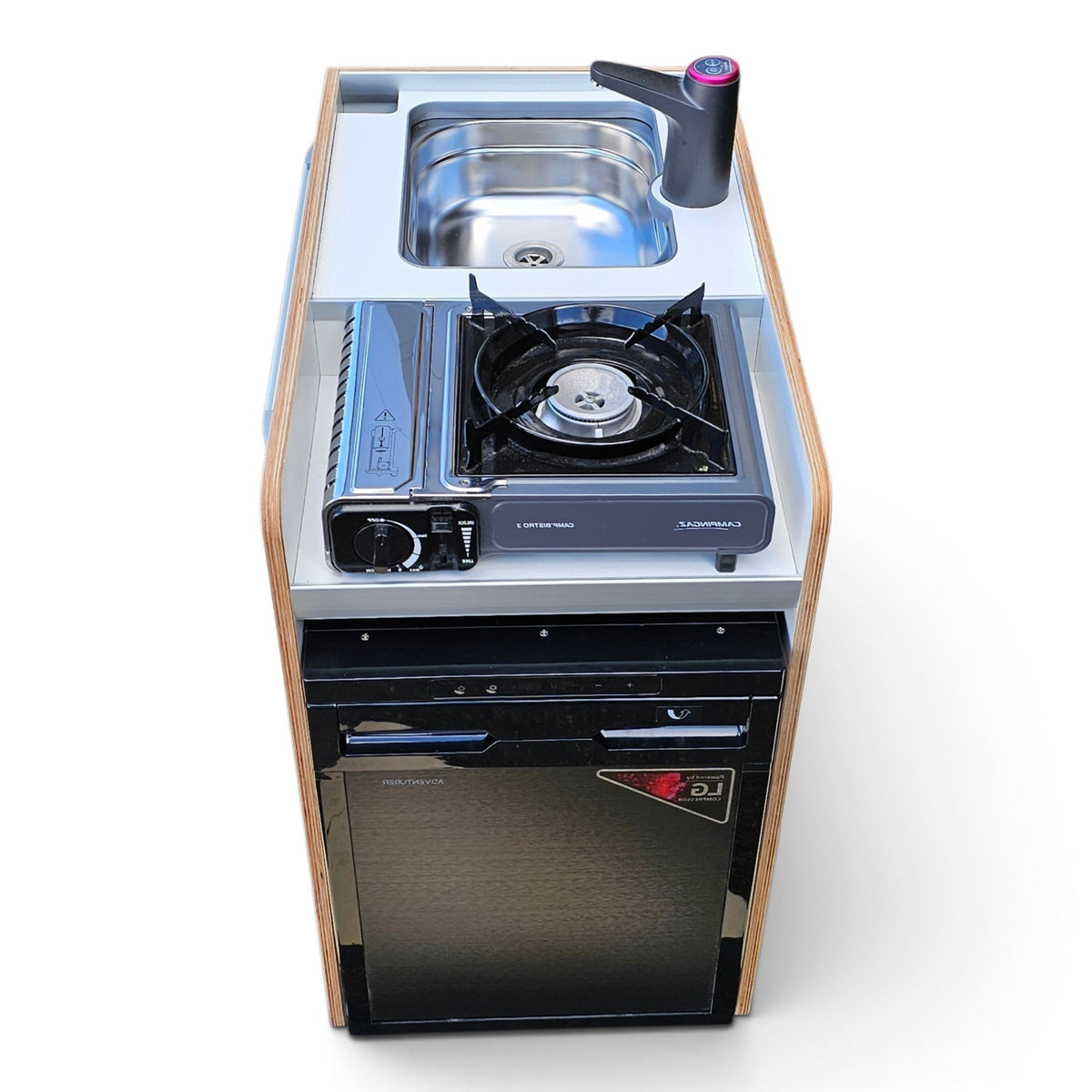 Compact kitchenette appliance set with a built-in single-burn gas stove, stainless steel sink, black refrigerator, and wood-tone sides, shown on a clean white background.